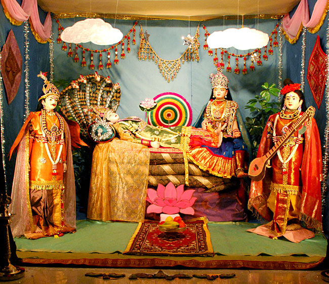 Lord Vishnu, his consort and Narada Muni